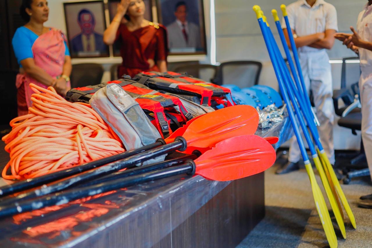 Rescue ropes, life jackets and paddles laid out at the handover at Nalanda College